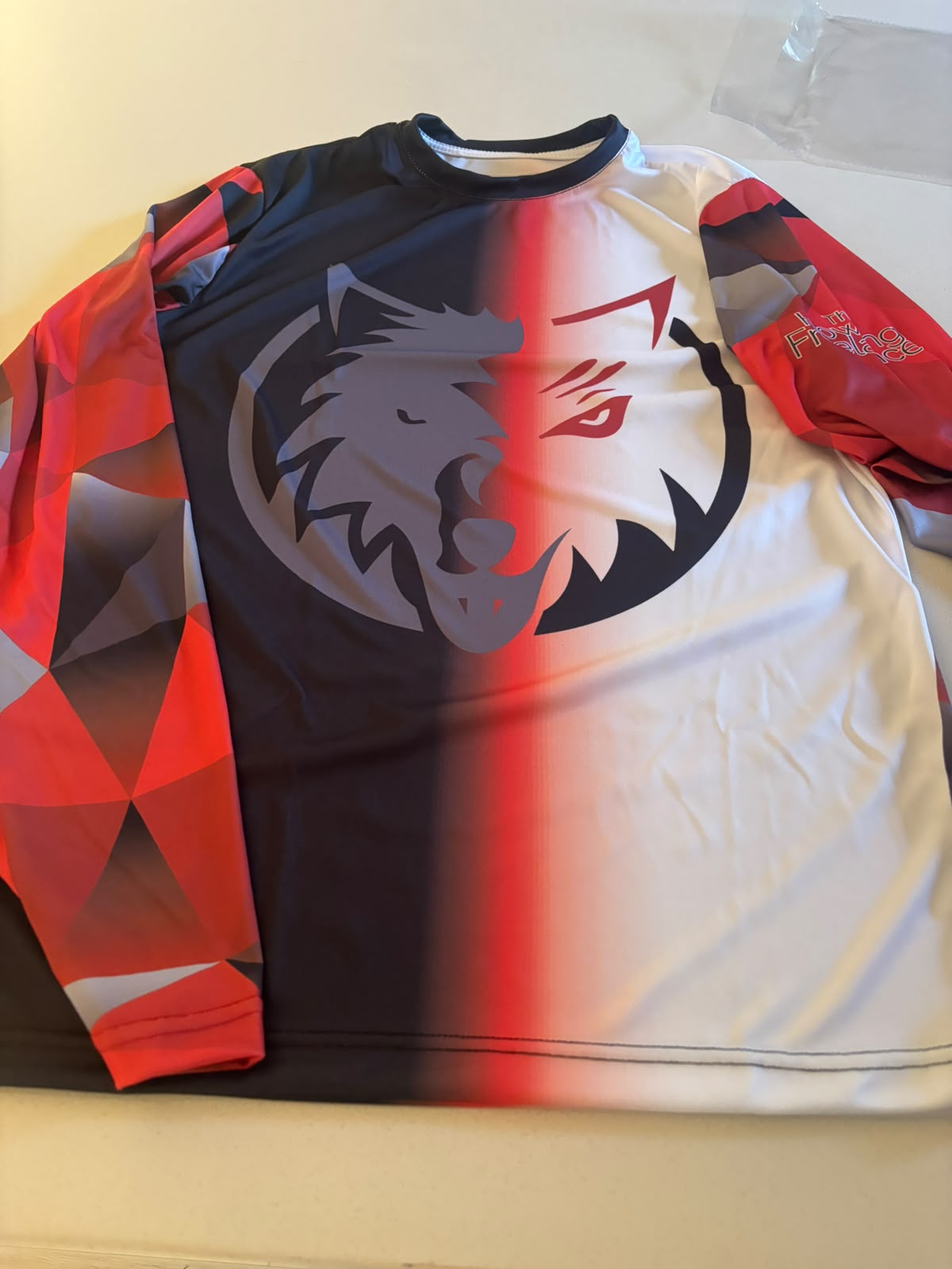 The Howling Freelancer sublimated jersey, black and red colourway
